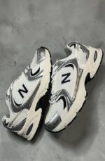 Tênis NB 530 Offwhite / Prata